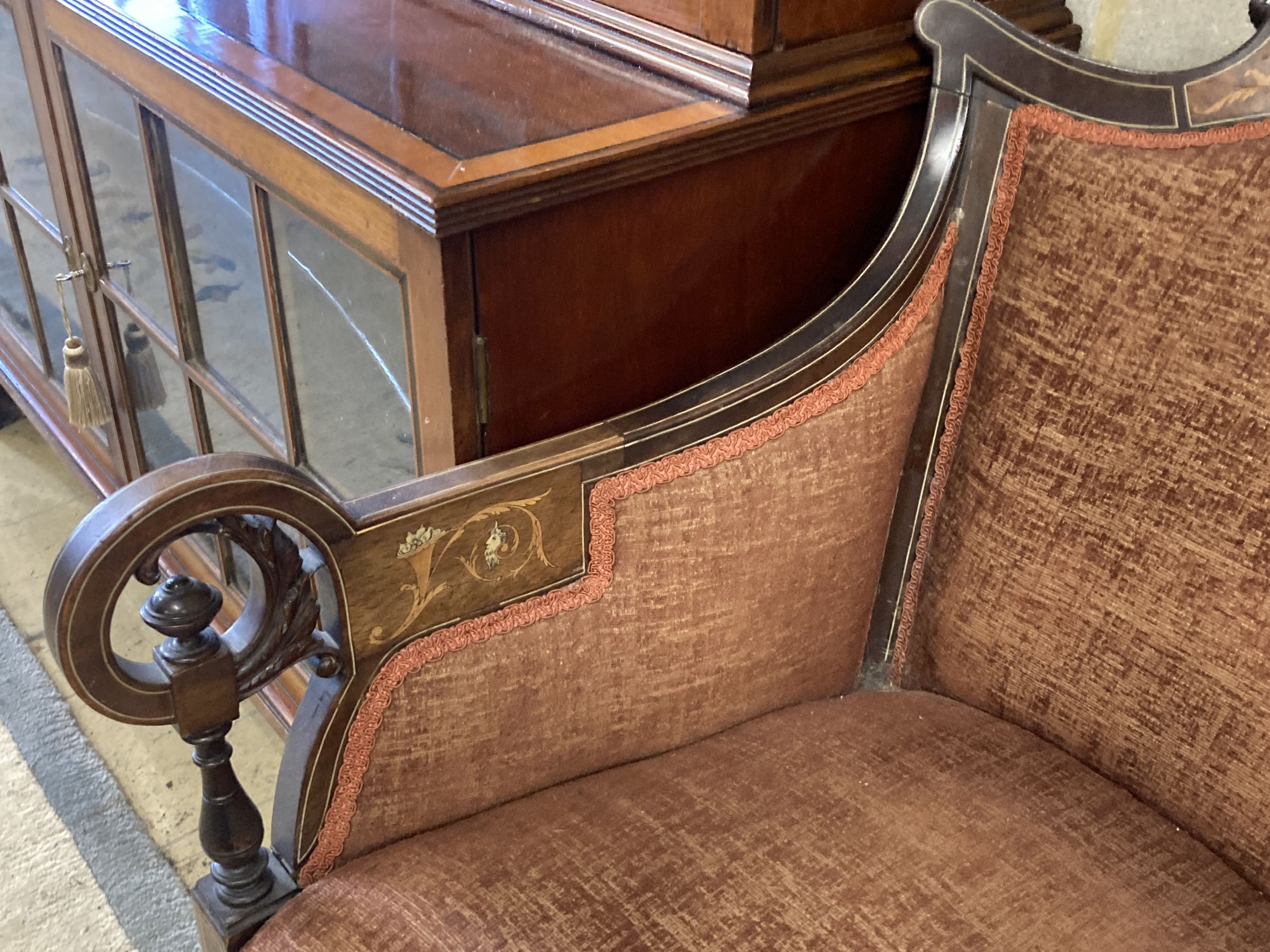 A late Victorian marquetry inlaid rosewood armchair, width 62cm, depth 70cm, height 78cm